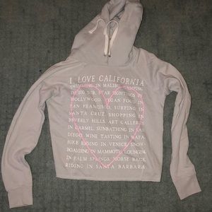 grey cropped sweater with quote